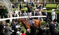 Frankie Dettori leaps off Stradivarius as he celebrates after winning the Gold Cup.