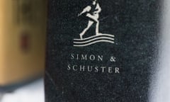 A book published by Simon &amp; Schuster is displayed on Saturday, July 30, 2022, in Tigard, Ore. The government and publishing titan Penguin Random House are set to exchange opening salvos in a federal antitrust trial Monday as the U.S. seeks to block the biggest U.S. book publisher from absorbing rival Simon &amp; Schuster. (AP Photo/Jenny Kane)