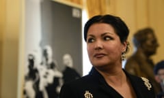 FILE - Russian soprano Anna Netrebko answers reporters' questions prior to the start of a news conference to present Giuseppe Verdi's 'Macbeth', directed by Italian conductor Riccardo Chailly, who will open the opera season at the La Scala opera house, in Milan, Italy, Monday, Nov. 29, 2021. Netrebko says she plans to resume performing in late May after announcing in the early days of the war in Ukraine that she was taking a “step back” from the stage. Netrebko also repeated her opposition to the war in a statement issued on Wednesday, March 30, 2022 and said she is not "allied with any leader of Russia.” (AP Photo/Luca Bruno, File)