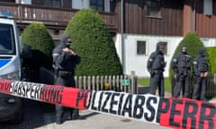 German police outside the lakeside residence of  Alisher Usmanov in Bavaria