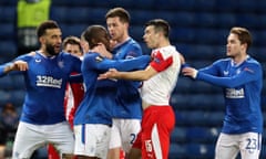 Glen Kamara argues with Slavia Prague’s Ondrej Kudela (second right) during the Europa League match.