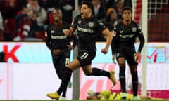 Leverkusen players celebrate their comeback win at Köln.