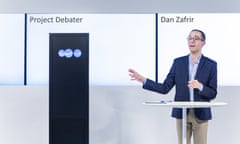 IBM’s Project Debater with one of its human opponents.