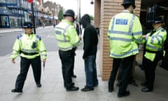 Police carrying out stop and search checks in London.