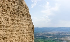 Greek alphabet<br>Ancient Greek writing chiselled on stone