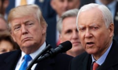 Donald Trump, left, listens to Orrin Hatch give a speech