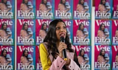 Faiza Shaheen holding a microphone