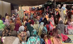 Crowds of people wait at an MSF clinic clinic in Zamzam camp, 15km from El Fasher, North Darfur.