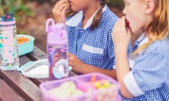 Schoolgirls eating a healthy lunch