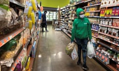 FILE PHOTO: Shoppers are seen at Whole Foods in Los Angeles, California<br>FILE PHOTO: Shoppers are seen at a Whole Foods store as the coronavirus outbreak continues in Los Angeles, California, U.S., April 2, 2020. Picture taken April 2, 2020. REUTERS/Lisa Baertlein/File Photo