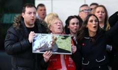 Families sing after verdict