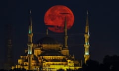 Supermoon rises behind the Sultan Ahmet Mosque in Istanbul, Turkey on July 26, 2018.