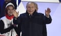 Vladimir Putin greets the crowd as Russian citizens gathered in Red Square