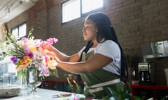 Florist arranging bouquet in flower shop