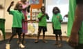Indigenous children do the hokey pokey during a Wubuy language class at the Numbulwar school in eastern Arnhem Land, Australia. Photograph: Helen Davidson for the Guardian