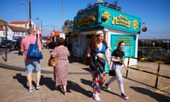 People on the seafront in Scarborough's South Bay