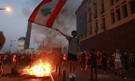 Beirut blast: protests mark one year since deadly port explosion – video report
