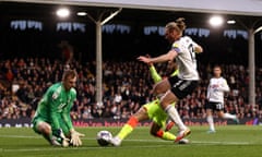 Philip Zinckernagel pokes the ball beyond Fulham keeper Marek Rodak.