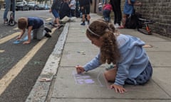 children and parents outside Chisenhale school in east London.