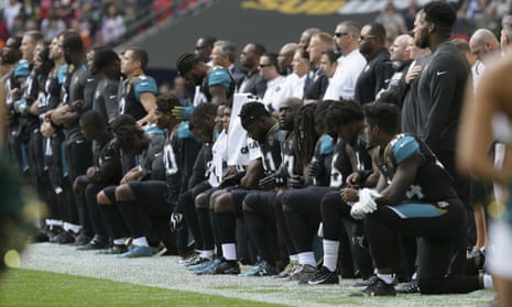 NFL players protest during the US national anthem at Wembley – video