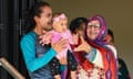 Fatima Maroof, centre, celebrates her mother's half-century for Pakistan against Australia from the pavilion at the Bay Oval.