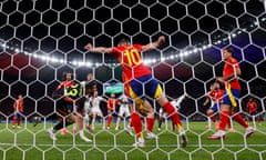 Dani Olmo clears Marc Guéhi’s header off the line in stoppage time.