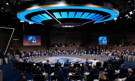 Joe Biden and other world leaders attend a session of the Nato summit in Washington.