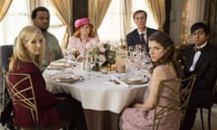 This image released by Fox Searchlight Pictures shows, from left, Lisa Kudrow, Craig Robinson, June Squibb, Stephen Merchant, Anna Kendrick and Tony Revolori in a scene from the film, “Table 19.” (Jace Downs/Fox Searchlight via AP)