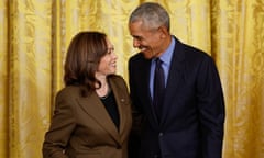 Kamala Harris and Barack Obama smiling at each other