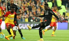 Folarin Balogun (centre right) in action for Reims.