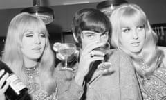 George Best<br>Manchester United footballer George Best celebrates the opening of his fashion boutique with a few glasses of champagne.
14th September 1967.