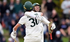 Australia’s Pat Cummins and Alex Carey celebrate