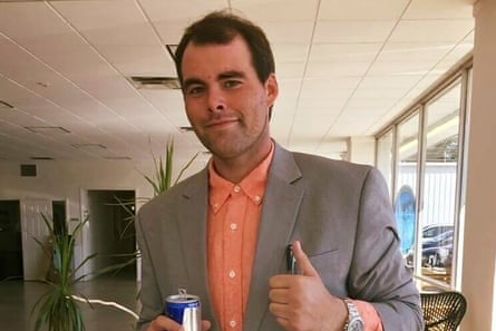 man wearing gray suit and pink button-down