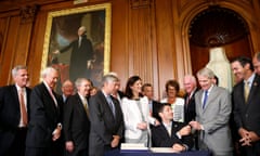 US Speaker of the House Paul Ryan hosts a signing ceremony for the ‘Comprehensive Addiction and Recovery Act’<br>epa05424637 US Speaker of the House Paul Ryan (seated), with bicameral bipartisan lawmakers, gives his pen to US Republican Senator from Ohio Rob Portman (3-R) during a signing ceremony for the ‘Comprehensive Addiction and Recovery Act’, in the US Capitol in Washington, DC, USA, 14 July 2016. EPA/SHAWN THEW