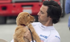 Kevin Costner voicing a golden retriever and Milo Ventimiglia in The Art of Racing in the Rain