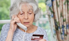 Senior Woman Giving Credit Card Details On The Phone