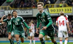 Isaac Price celebrates after putting Northern Ireland in front at Windsor Park.