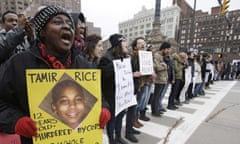 Demonstrators protest over the police shooting of Tamir Rice in Cleveland on 25 November 2014. 