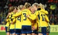 Rebecka Blomqvist celebrates with teammates after putting her team ahead against Argentina.