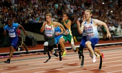 Jonnie Peacock, right, wins the T44 100m at the World Para Athletics Championships.