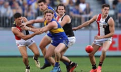 St Kilda's Marcus Windhager and West Coast's  Harley Reid compete for the ball in their AFL match at Optus Stadium