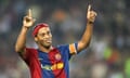 Barcelona's Brazilian Ronaldinho celebrates after scoring against Sevilla during their Spanish league football match at the Camp Nou stadium in Barcelona, 15 October 2006.