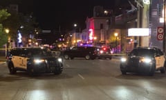 Police vehicles block a street in Minneapolis early Monday, June 14, 2021, after a woman was killed and three others were injured when an SUV struck a parked car and tossed it into demonstrators during a protest in the Minneapolis neighborhood where a Black man was fatally shot earlier this month during an arrest attempt, police and witnesses said Monday. (Matt Serpic/Minnesota Public Radio via AP)