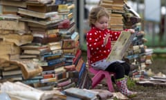 Hay Festival Of Literature And The Arts -2014<br>HAY-ON-WYE, WALES - MAY 28: Maeve Magee, 3, reads a book during the Hay Festival on May 28, 2014 in Hay-on-Wye, Wales. The Hay Festival is an annual festival of literature and arts which began in 1988. (Photo by Matthew Horwood/Getty Images)