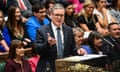 Keir Starmer stands and speaks in the House of Commons during his first Prime Minister's Questions as prime minister, Wednesday 24 July; his ministers are seen on the bench behind him