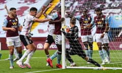 Villa goalkeeper Ørjan Nyland carries the ball over the goal line in the first half