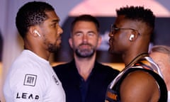 Antony Joshua and Francis Ngannou during the face off ahead of their fight