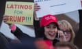 A woman hoods a sign expressing Latino support for Republican presidential candidate Donald Trump at his campaign rally at the Orange County Fair and Event Center, April 28, 2016, in Costa Mesa, California.
Trump is vying for votes in the June 7 California primary election in hope of narrowing the gap to the 1,237 delegates needed to win the Republican presidential nomination.