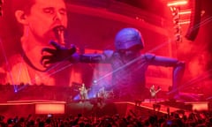 Operatic space rock … Muse perform their Simulation Theory stadium tour.