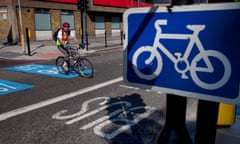 A man cycling in London